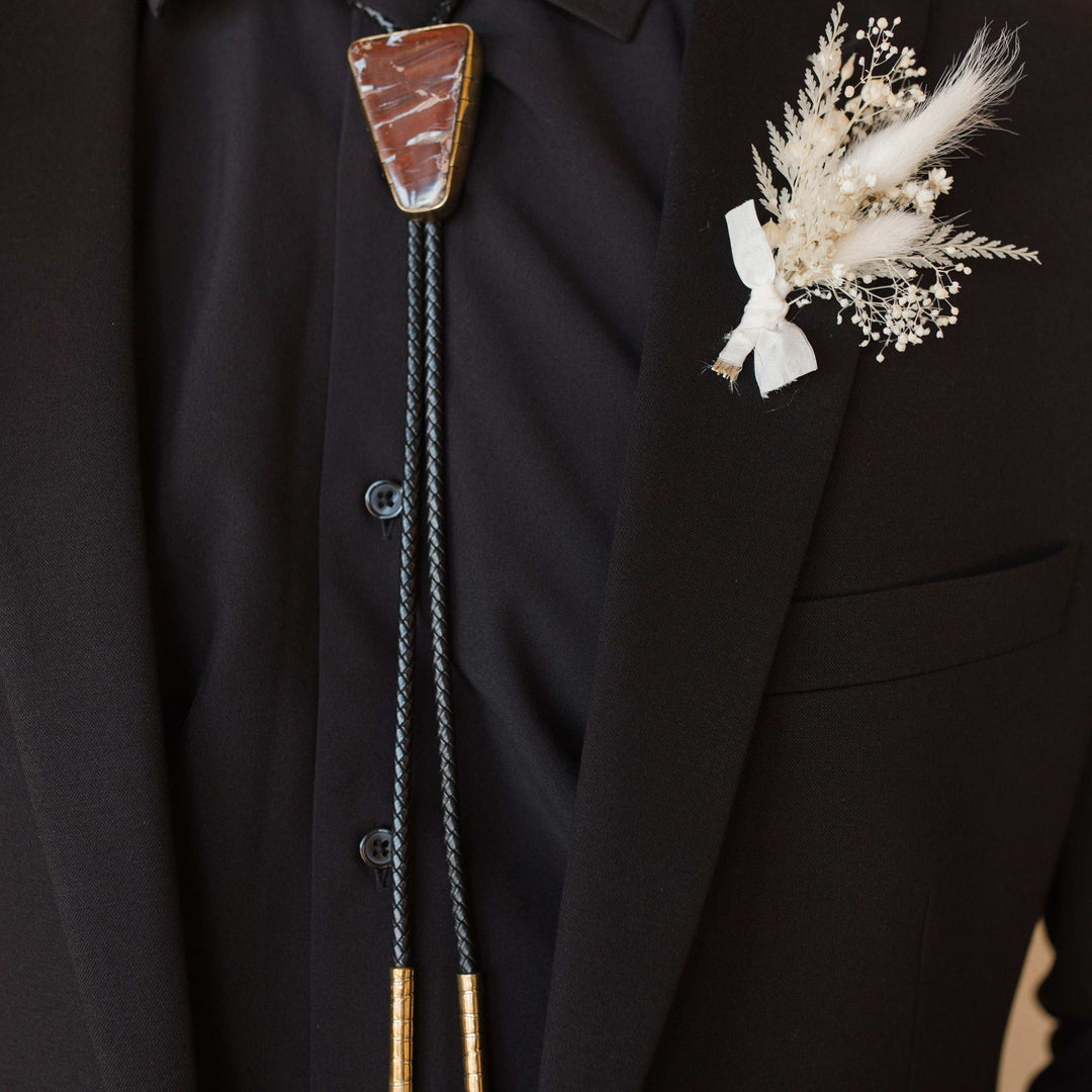 Rattlesnake Jasper Bolo Tie on Groom for Wedding