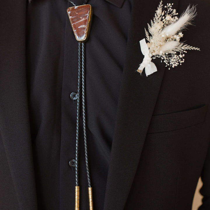 Rattlesnake Jasper Bolo Tie on Groom for Wedding