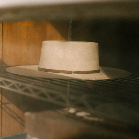 Elevate your look with our trendy flatbrim hat, boasting a structured crown and wide, flat brim for a fashion-forward statement. Made with quality materials, this Western-style cowboy hat blends style and versatility seamlessly. Ideal for adding flair to any ensemble, it's a must-have accessory for urban and casual wear.