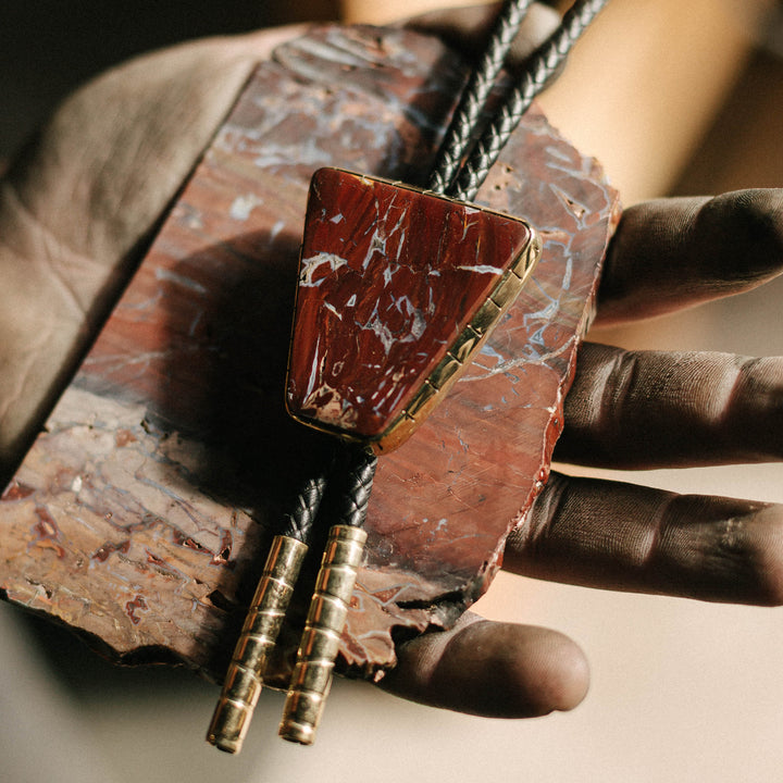 Rattlesnake Jasper bolo tie with slab in hand