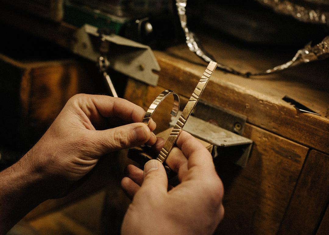 Image of brass metal cuff in the workshop