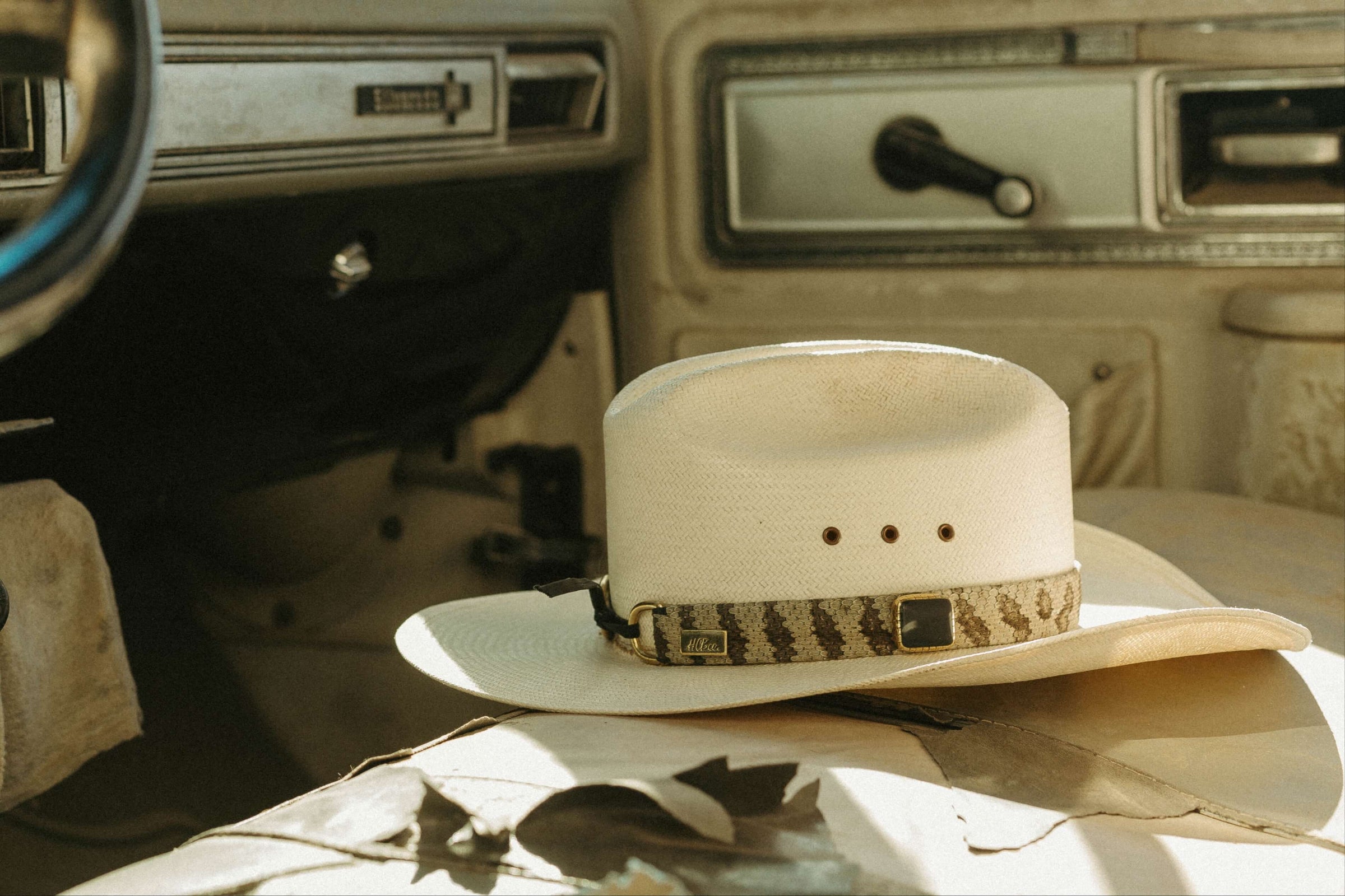 Rattlesnake Hatband on White Cowboy Hat - Lifestyle Photo